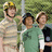 Group of six people in sports uniforms with green text 'LOL!!!!' overlaid on the right side.