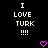 Black background with white pixelated text reading "I LOVE TURK !!!!" and two pink pixelated hearts below the text.