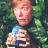 A 48x48 pixel buddy icon split into two frames showing a character holding an object on the left and promotional text for 'Scooby Doo 2' on the right, with visible pixelation and dithering effects.