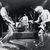 A 50x50 pixel animated contact sheet showing two frames of a black-and-white icon with abstract figures and the band name "NIRVANA" in stylized text.