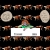 Pixelated static image of a figure with brown hair and green clothing standing behind a white rectangular object with two gray rectangles on it, surrounded by repeated brown and beige shapes on black background.