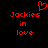 Red pixelated text 'Jackies in love' with a heart symbol above the left instance on black background.