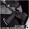 Black-and-white image of two people walking, with text at bottom reading 'last night i saw my world explode.'
