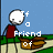 Pixelated cartoon character with white head and red shirt stands on sidewalk, holding brown box as text changes