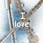 A pixelated image of a person in blue clothing with crossed arms, displaying text that changes from 'I love' to 'my ALUTE!'