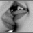 Black-and-white close-up of a person's face with mouth open, surrounded by red pixelated text on white background.