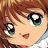 A pixelated anime-style character with brown hair and green eyes on the left, next to a black background with white text reading "Anime IM" and "COM" on the right.