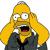 Pixelated yellow-skinned cartoon character with large white eyes, black pupils, and red mouth interior, wearing dark suit and black tie, hands raised near head in expressive gesture.