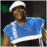 six distinct figures in performance attire with visible text on clothing, each captured mid-action against varied stage backgrounds