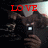 A person holds a camera with a bright flash, red text overlays change between frames.