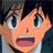 Pixelated anime-style character face with open mouth and wide eyes next to stylized text on black background, part of a 2-frame contact sheet.