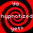 Four identical red and black spiral patterns arranged in a with white text reading "Yo hypnotized yet?" overlaid on each spiral