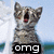 A pixelated cat with tabby stripes and red mouth opens its eyes wide against a blurred background of blue sky, green water, and white trees.