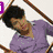 Six distinct pixelated portraits of a young man with dark curly hair, each in different poses and clothing styles, arranged in two