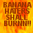 A pixelated image with bold text over a fiery background, displaying 'BANANA HATERS SHALL BURN!!' in brown letters.