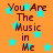 Orange background with cyan stars and brown text reading "You Are The Music in Me" repeated four times in a