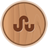 Circular wooden icon with a brown StumbleUpon symbol centered on a light brown wood grain background.