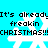 Pixelated blue background with white snowflakes and black text repeating 'It's already freakin CHRISTMAS!!!' in a retro digital style.