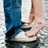 A four- with a foot in jeans and sneakers on the top-left, pink text on dark green backgrounds for three , and gray background on bottom-right