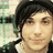 Pixelated image of a person with dark hair and a dark beanie, split into four quadrants with green and gray backgrounds and red text.