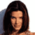 Static pixelated image of a person with long dark hair against a light background, rendered in low-resolution style typical of early internet icons.