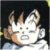Pixelated image of a light-colored animal with large ears and dark eyes, positioned against a dark background.