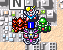 Pixelated character with yellow eyes and blue chest plate stands amid red, green, purple, and white mechanical parts against gray cityscape background.