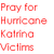 Three vertical of text in red, blue, and green display 'Pray for Hurricane Katrina Victims' on a white background with gray lower-right corner