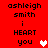 Red background with black text reading 'ashleigh smith i HEART you' and a white heart symbol on the left, and a pink heart symbol on the right.
