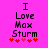 Pixelated text on bright pink background with red and pink hearts below, showing two animation frames where heart colors shift from alternating red/pink to all red.