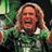 Pixelated static image of a person with long light brown hair wearing a green sports jersey, set against a blurred background with green and dark tones.