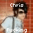 Pixelated image of a person with dark hair wearing a light shirt and suspenders against a red-brown background, with text above and below.
