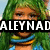 Pixelated character with green hair and blue-yellow neckwear, overlaid with text in two