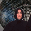 Animated sequence of a person in black clothing against a reflective disco ball background, showing hand gestures changing from neutral to pointing.