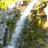 A static image with a waterfall background and bold white text reading "CHR IS TEN SEN" in two