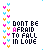 Animated contact sheet of 25 frames showing a pixel art animation with repeating text "DON'T BE AFRAID TO FALL IN LOVE" and colorful heart borders on white background.