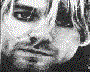 A black-and-white animated sequence of a person's face in multiple poses across four , showing subtle facial expression changes and head movements
