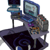 Pixelated desktop setup with two monitors, keyboard, mouse, and chair on a dark desk against white background.