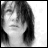 Black-and-white animated sequence showing a person with dark hair and a neutral expression, with text appearing incrementally on the right side.