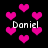 Black background with scattered pink pixelated hearts and repeated white text 'Daniel' in four locations.