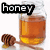 A honey jar with a wooden dipper appears in four , with text changing from 'honey' to 'bunches' to 'of love' across the top