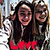 Two people in a group pose with long hair, wearing white tops and dark vests; red 'LOVE' text appears below them.