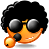 Animated orange emoji face with black afro hair, dark sunglasses, and a small microphone prop on its cheek.