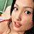 A pixelated image of a person in a pink bikini top with red straps, showing multiple views of the upper body and face.