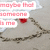 A pixelated image shows a gray fish-like creature with a red eye, holding a white speech bubble containing pink text that reads "maybe that someone is me" against a light gray background.