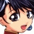 Pixelated anime-style character face with open mouth and wide eyes on left, adjacent to black background with white text "Anime IM" above smaller cursive "cOm" on right.