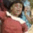 Pixelated image of a person in a red top with white trim, blue background, and blue text reading 'little inez stubbs' and 'Hairspray the movie 2007'