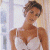 A 50x50 pixel animated contact sheet showing two frames of a woman in a white dress on the left and green text reading "Original Icons .com" on the right, with visible pixelation and dithering effects.