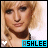 nine identical pixelated images showing a person with blonde hair and blue eyes, each labeled 'ASHLEE' in cyan text below