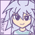 Pixelated anime-style character with light blue hair and teal shirt, shown in two side-by-side frames with subtle facial expression differences.